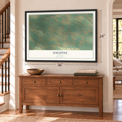 Umapine, Oregon map, 24 x 36 inch print in a black frame above a dresser by a staircase