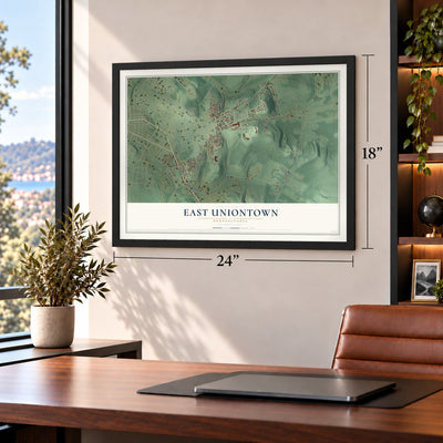 East Uniontown, Pennsylvania map, 18 x 24 inch print in a black frame in a home office