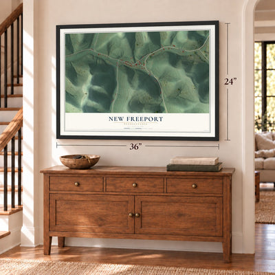 New Freeport, Pennsylvania map, 24 x 36 inch print in a black frame above a dresser by a staircase