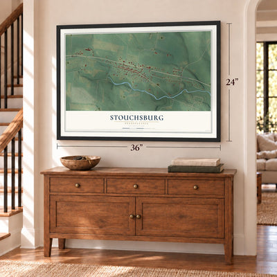 Stouchsburg, Pennsylvania map, 24 x 36 inch print in a black frame above a dresser by a staircase