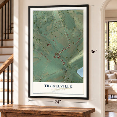 Troxelville, Pennsylvania map, 24 x 36 inch print in a black frame by a staircase