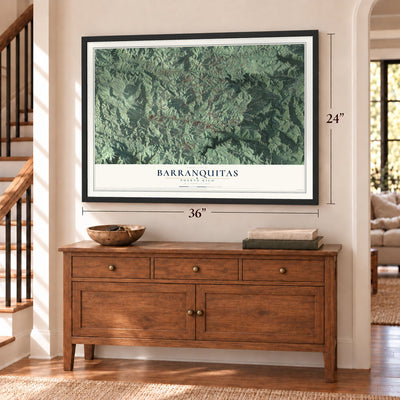 Barranquitas, Puerto Rico map, 24 x 36 inch print in a black frame above a dresser by a staircase