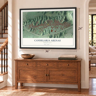 Candelaria Arenas, Puerto Rico map, 24 x 36 inch print in a black frame above a dresser by a staircase