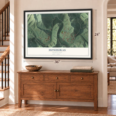 Honduras, Puerto Rico map, 24 x 36 inch print in a black frame above a dresser by a staircase