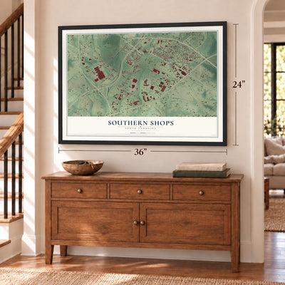 Southern Shops, South Carolina map, 24 x 36 inch print in a black frame above a dresser by a staircase