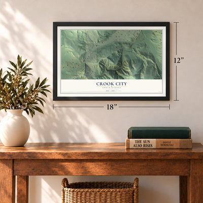 Crook City, South Dakota map, 12 x 18 inch print in a black frame in an entryway
