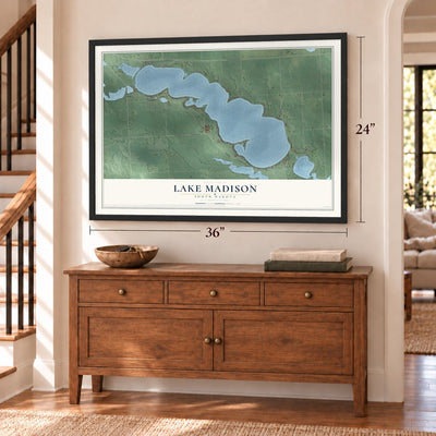 Lake Madison, South Dakota map, 24 x 36 inch print in a black frame above a dresser by a staircase