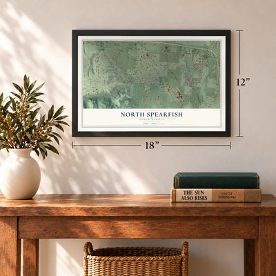 North Spearfish, South Dakota map, 12 x 18 inch print in a black frame in an entryway