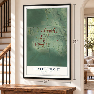 Platte Colony, South Dakota map, 24 x 36 inch print in a black frame by a staircase