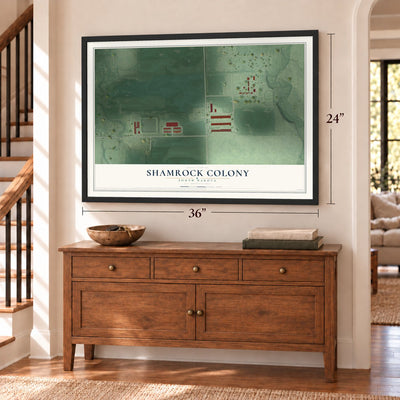 Shamrock Colony, South Dakota map, 24 x 36 inch print in a black frame above a dresser by a staircase