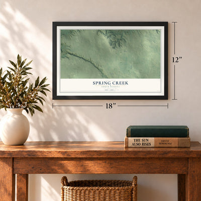 Spring Creek, South Dakota map, 12 x 18 inch print in a black frame in an entryway