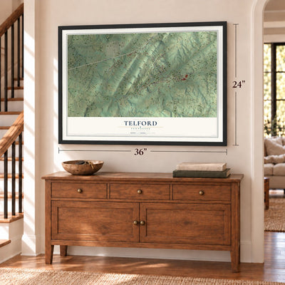 Telford, Tennessee map, 24 x 36 inch print in a black frame above a dresser by a staircase