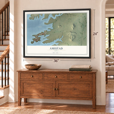Amistad, Texas map, 24 x 36 inch print in a black frame above a dresser by a staircase