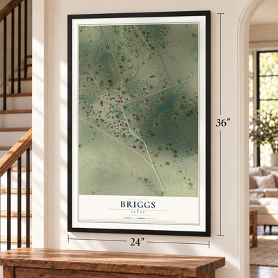 Briggs, Texas map, 24 x 36 inch print in a black frame by a staircase