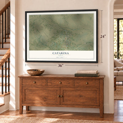 Catarina, Texas map, 24 x 36 inch print in a black frame above a dresser by a staircase