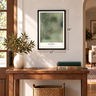 Knippa, Texas map, 12 x 18 inch print in a black frame in an entryway