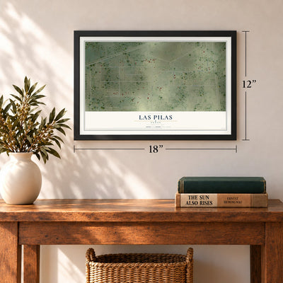 Las Pilas, Texas map, 12 x 18 inch print in a black frame in an entryway