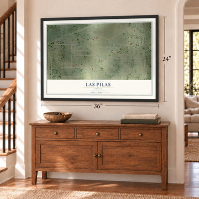 Las Pilas, Texas map, 24 x 36 inch print in a black frame above a dresser by a staircase