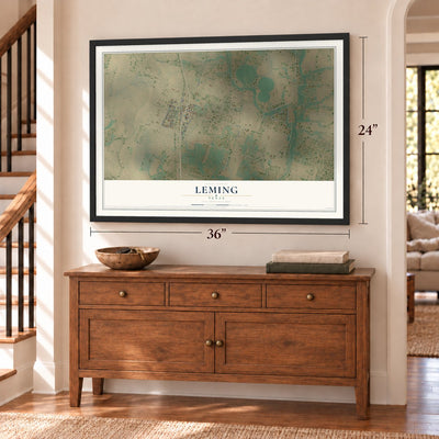 Leming, Texas map, 24 x 36 inch print in a black frame above a dresser by a staircase