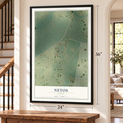 Netos, Texas map, 24 x 36 inch print in a black frame by a staircase
