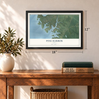 Pine Harbor, Texas map, 12 x 18 inch print in a black frame in an entryway