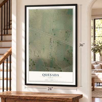 Quesada, Texas map, 24 x 36 inch print in a black frame by a staircase