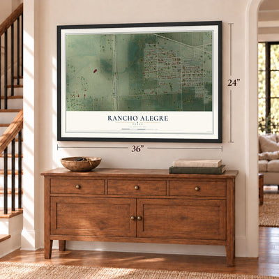 Rancho Alegre, Texas map, 24 x 36 inch print in a black frame above a dresser by a staircase