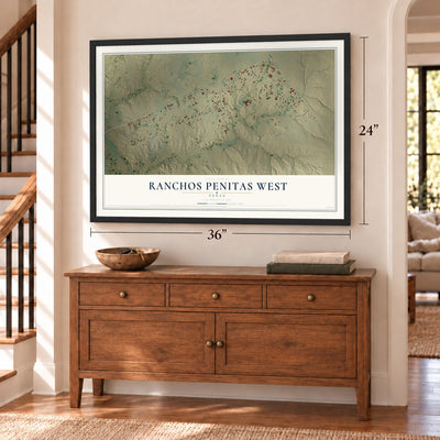 Ranchos Penitas West, Texas map, 24 x 36 inch print in a black frame above a dresser by a staircase