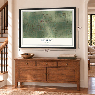 Ricardo, Texas map, 24 x 36 inch print in a black frame above a dresser by a staircase