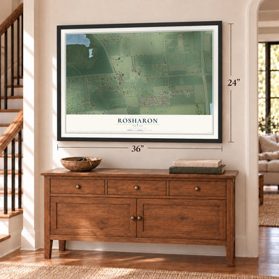 Rosharon, Texas map, 24 x 36 inch print in a black frame above a dresser by a staircase