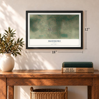 Skidmore, Texas map, 12 x 18 inch print in a black frame in an entryway