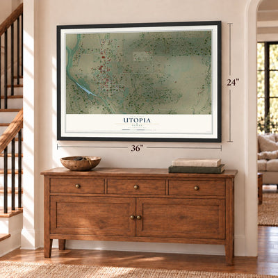 Utopia, Texas map, 24 x 36 inch print in a black frame above a dresser by a staircase