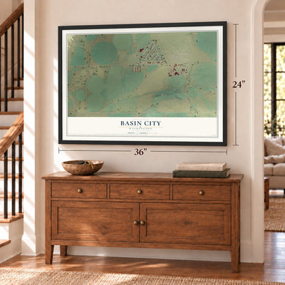 Basin City, Washington map, 24 x 36 inch print in a black frame above a dresser by a staircase