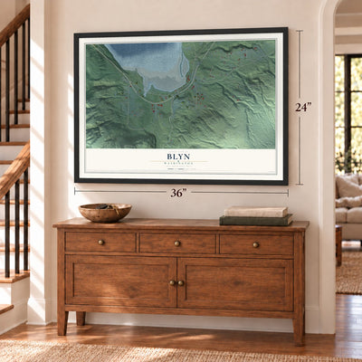 Blyn, Washington map, 24 x 36 inch print in a black frame above a dresser by a staircase