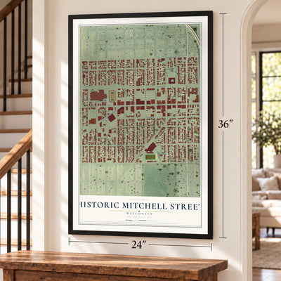 Historic Mitchell Street, Wisconsin map, 24 x 36 inch print in a black frame by a staircase