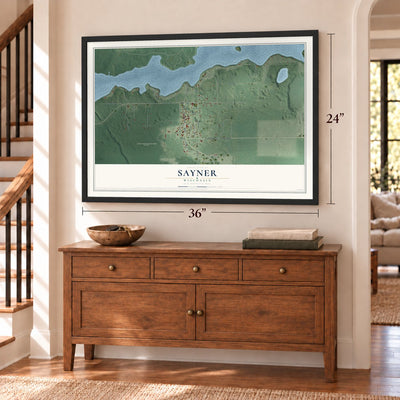 Sayner, Wisconsin map, 24 x 36 inch print in a black frame above a dresser by a staircase
