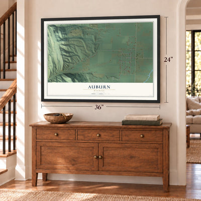Auburn, Wyoming map, 24 x 36 inch print in a black frame above a dresser by a staircase
