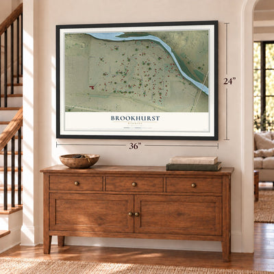 Brookhurst, Wyoming map, 24 x 36 inch print in a black frame above a dresser by a staircase