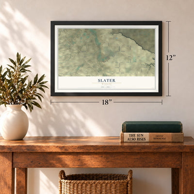Slater, Wyoming map, 12 x 18 inch print in a black frame in an entryway