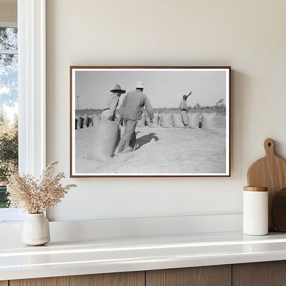 Laborers Moving Rice Sacks in Crowley Louisiana 1938 - Available at KNOWOL