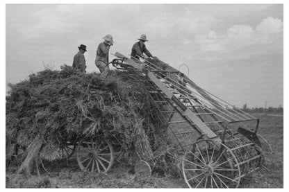 Loading Machine on Hay Wagon Lake Dick Arkansas 1938 - Available at KNOWOL