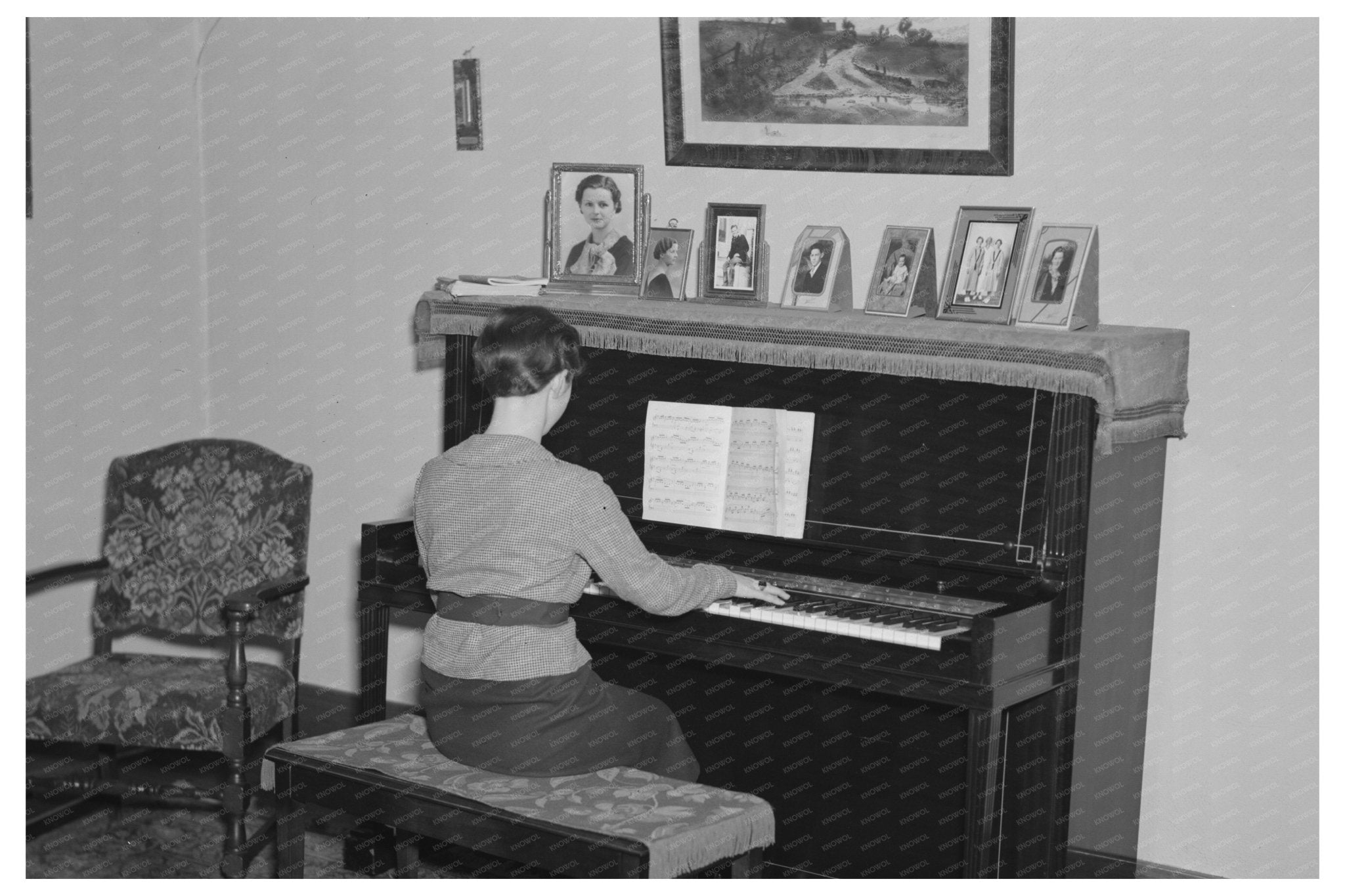 Lois Madsen Playing Piano at Family Farm Iowa 1936 - Available at KNOWOL