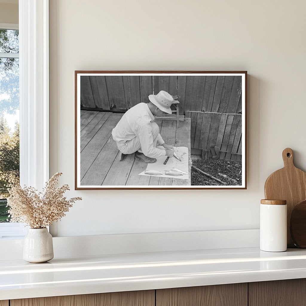 Man Cleaning Fish in Olga Louisiana September 1938 - Available at KNOWOL