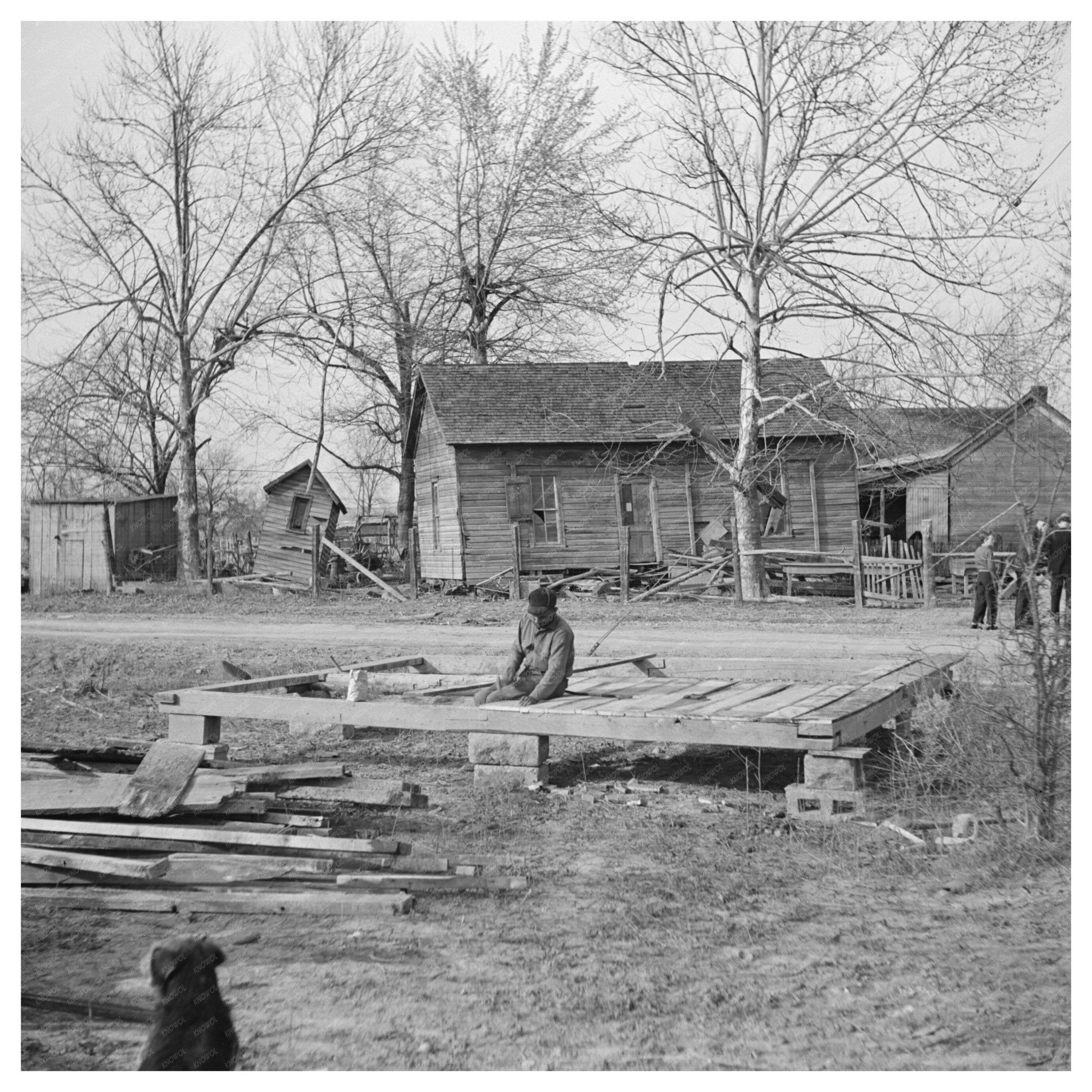 Man Rebuilding Home in Shawneetown Illinois 1937 - Available at KNOWOL