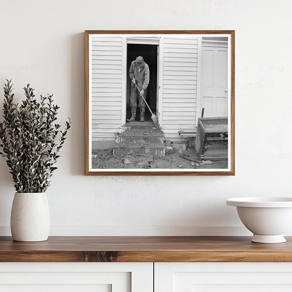 Man Sweeping Mud from Steps in Posey County Indiana 1937 - Available at KNOWOL