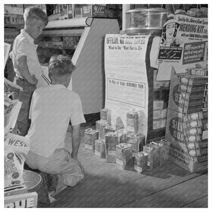 Maynard Clark and Guy Davenport Reading Air Raid Instructions 1942 - Available at KNOWOL