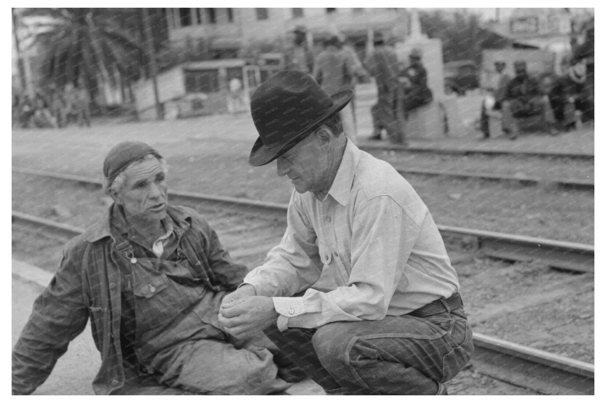 Men Inspecting Secondhand Tires in Corpus Christi 1939 - Available at KNOWOL