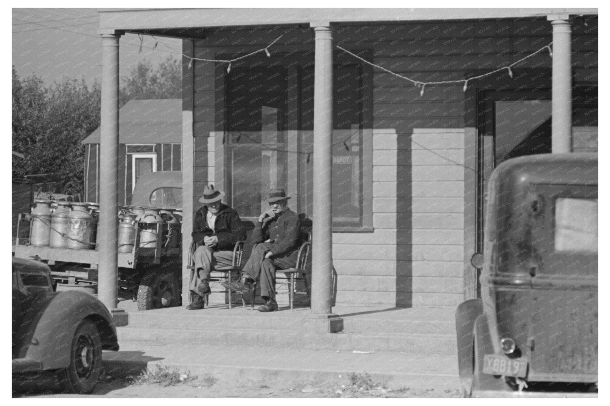 Men Seated at Hotel in Little Fork Minnesota 1937 - Available at KNOWOL