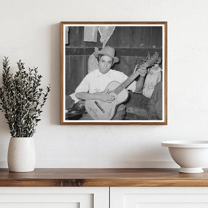 Mexican Boy Playing Guitar in Robstown Texas 1939 - Available at KNOWOL