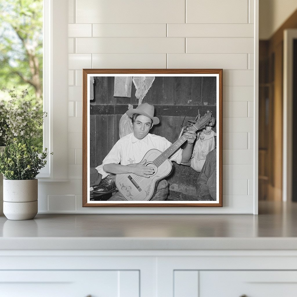 Mexican Boy Playing Guitar in Robstown Texas 1939 - Available at KNOWOL